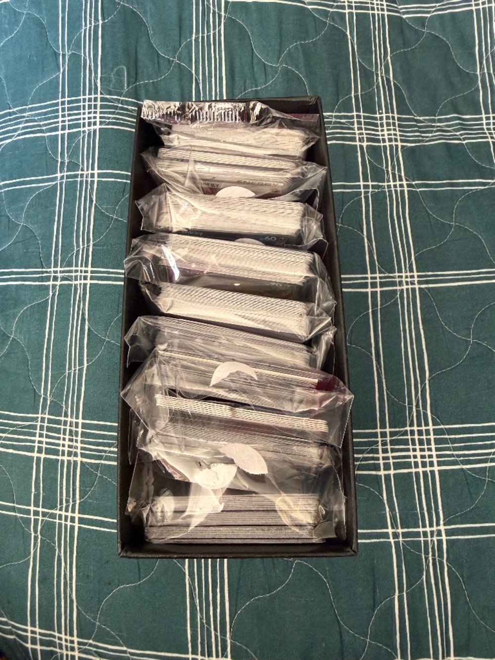 Pokémon cards, coins, and box